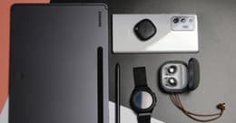 samsung phone, tablet and headphones on a table